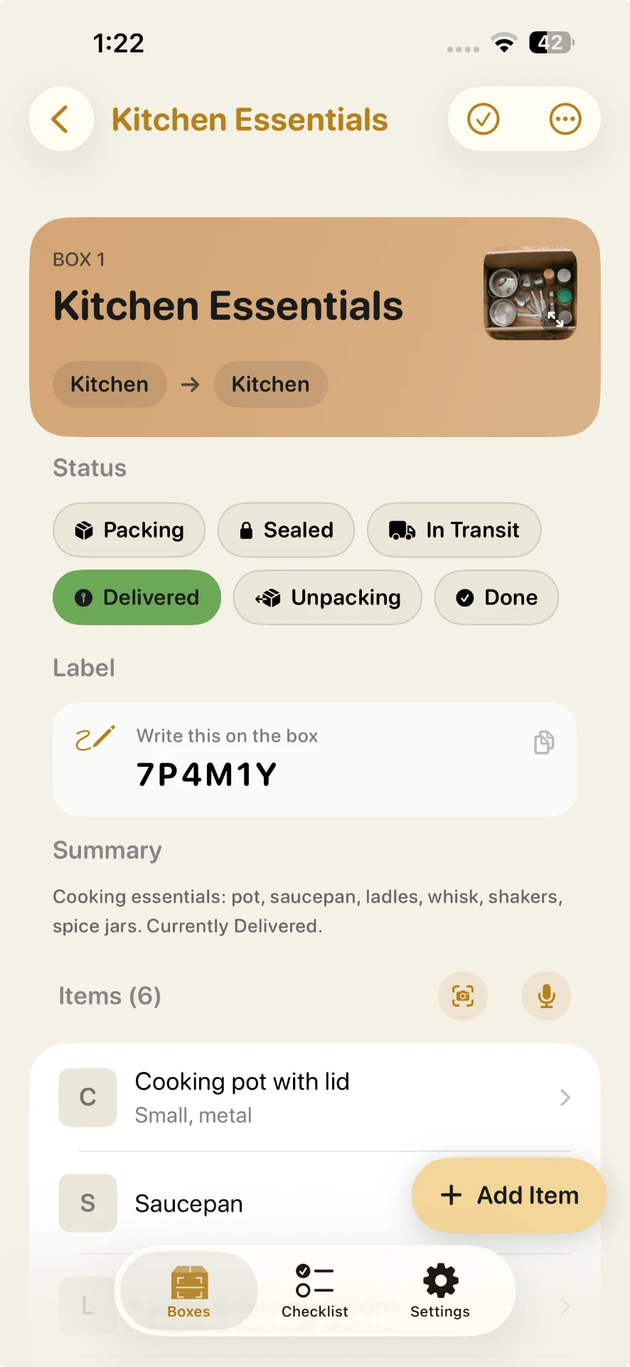 Kitchen Essentials box detail showing a generated short code 7P4M1Y to write on the box by hand